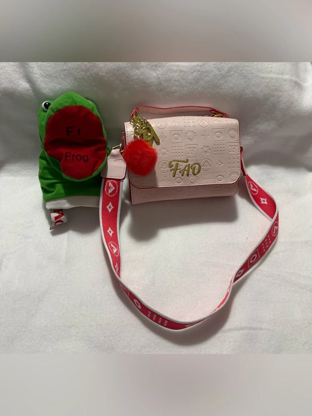 FAO Schwarz Blush Pink Embossed Crossbody Bag Red Strap Frog Hand Puppet
